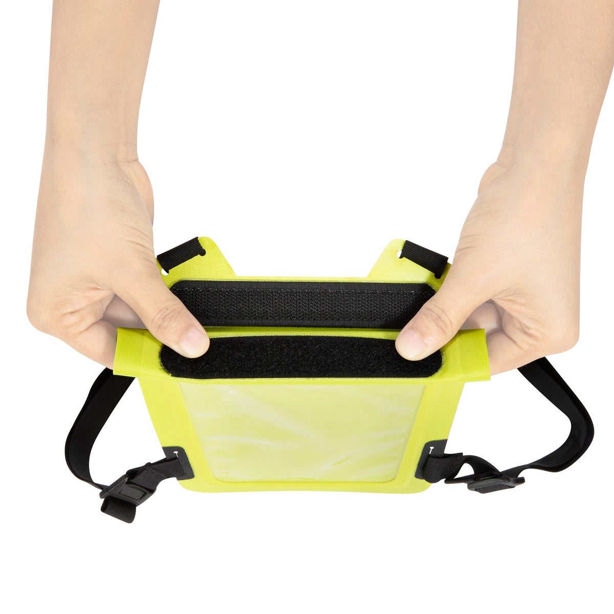 Close up of waterproof roll closure with hook-and-loop (like Velcro) on top of Tatonka women's chest holster - Yellow with Black Webbing