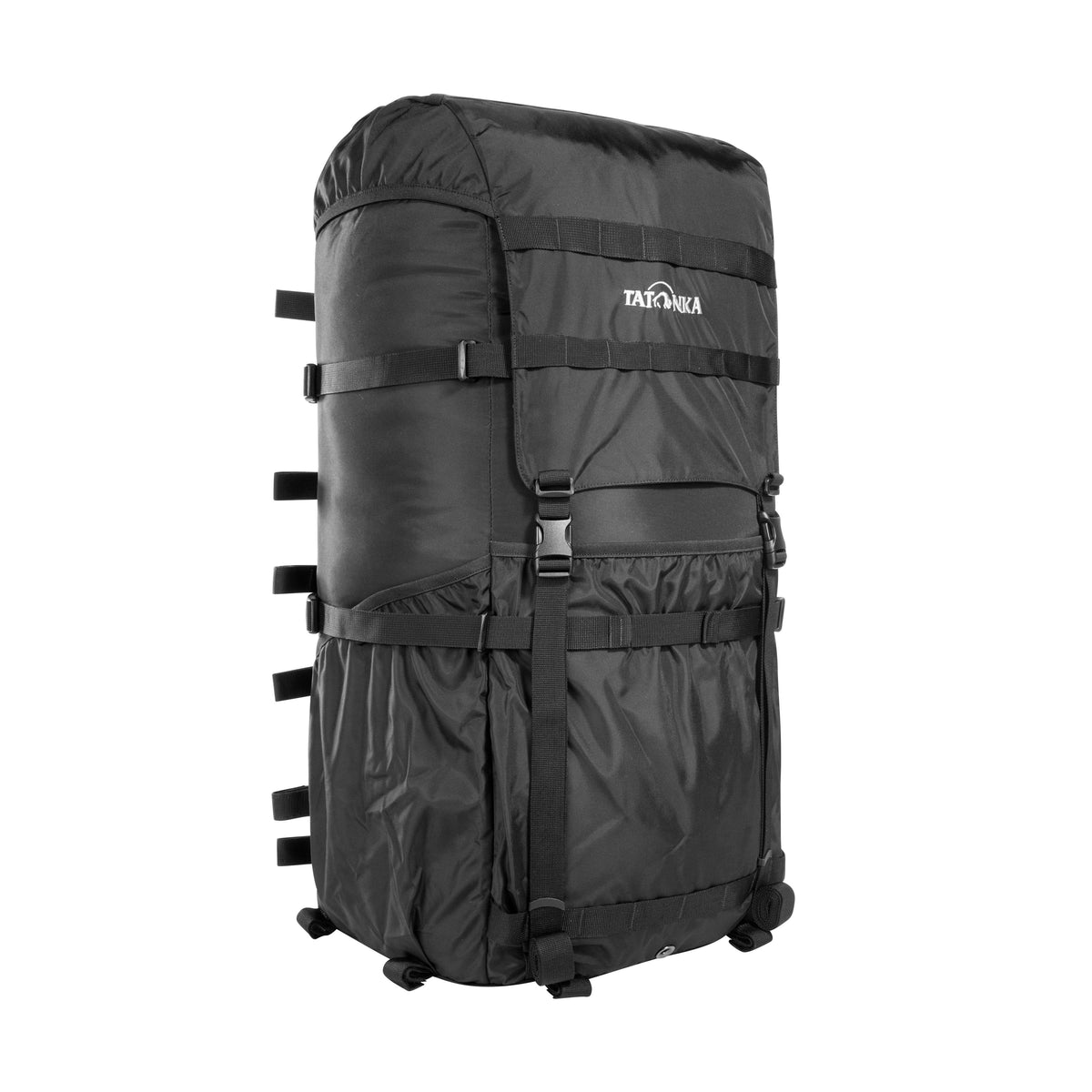 Front three quarter view of a Tatonka Lastenkraxe pack sack for use with the load carrier frame, converting it to a full-size external frame pack. Features throat extension with two drawstrings under the lid, external compression straps and very large pockets on each side and the front. Also has 25mm webbing loops on the lid and front – Black
