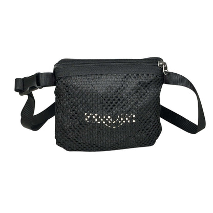 View of Tatonka superlight backpack shown folded into the integrated belt bag  - Black