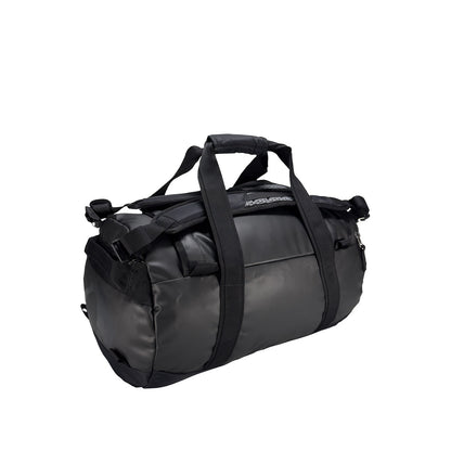 Back three-quarter view of 25 litre Tatonka barrel bag with adjustable, top carry handles, grab handles on both ends, and padded, removable and adjustable backpack shoulder straps. Main body has compression straps and a padded bottom - Black