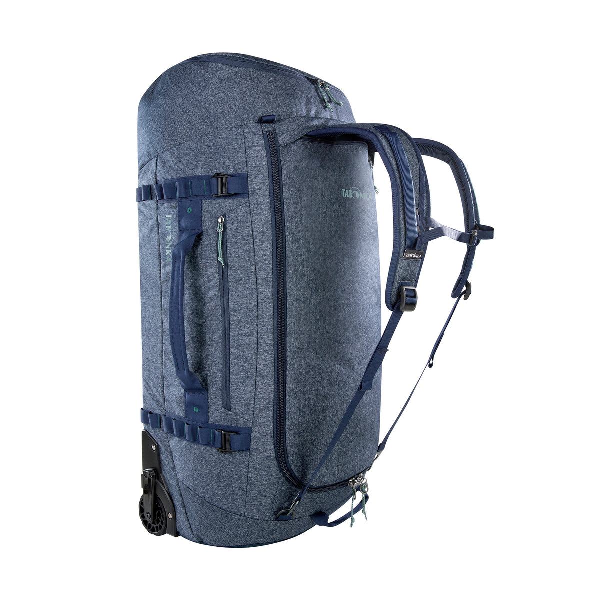 Back three-quarter view of 105 litre Tatonka Duffel Roller with side zip pocket and compression straps, stowaway shoulder straps, grab handles on top and side, large zip opening for main compartment with lockable zip slider. Shown with stowaway shoulder straps deployed - Navy