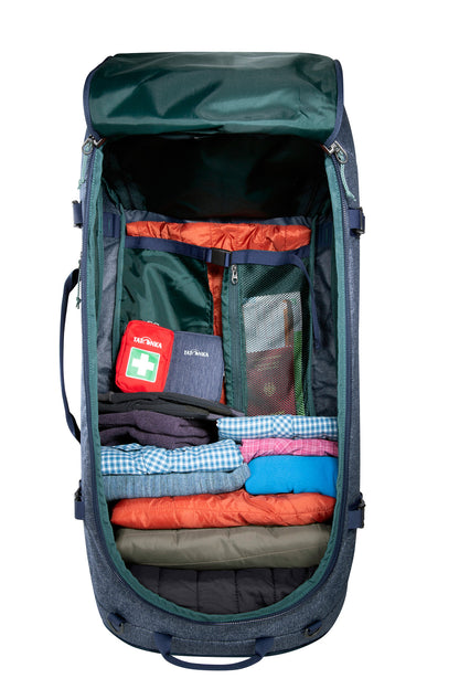 Overhead image of Tatonka Duffel Roller with zippered lid opened out completely to show packed contents - Navy