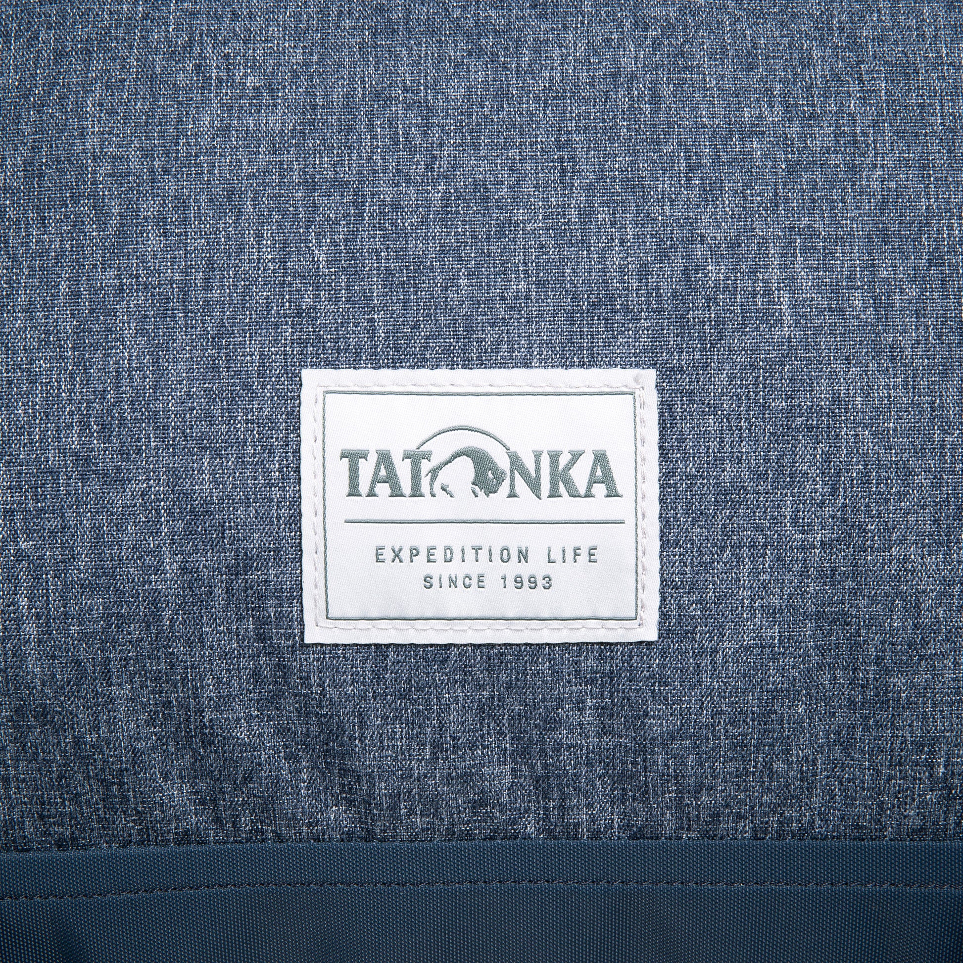 Close up of Tatonka Expedition Life since 1993 badge on Tatonka Duffel Roller - Navy