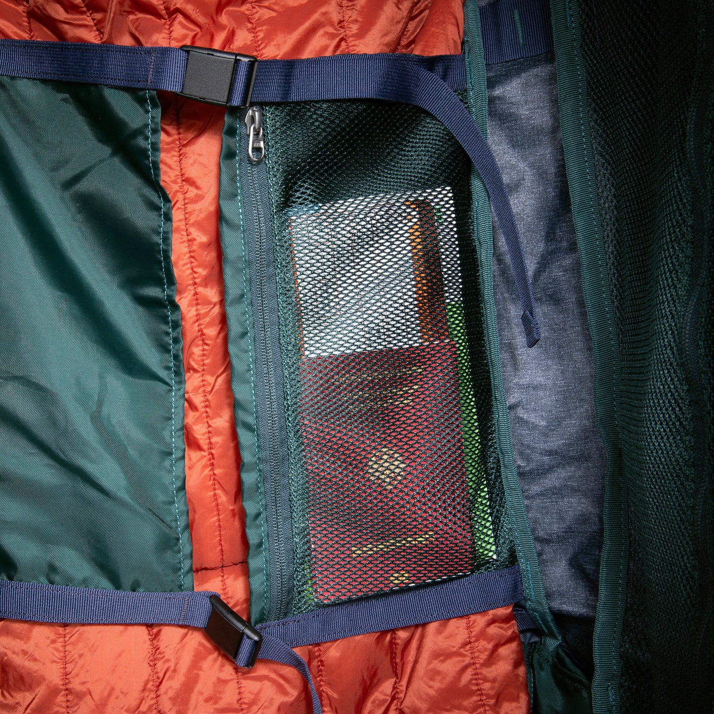 Close up of mesh zipped poked on inside of Tatonka Duffel Roller